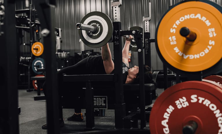 Members training on the main floor at Strong Barbell Club in Manhattan, Kansas
